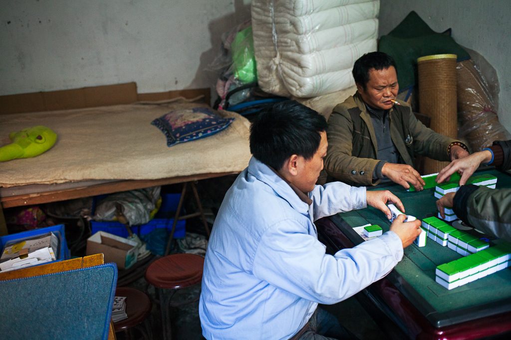 A popular hobby is mahjong, not just with the group of workers but all around China—particularly among the middle to older generations. These men play in one of the bedrooms of the management.