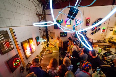 Neon gems hang from the ceiling in Flechtner's studio. 
