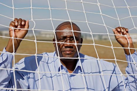 Thulani Mabaso, former Robben Island prisoner, on the soccer field in Robben Island, South Africa. 