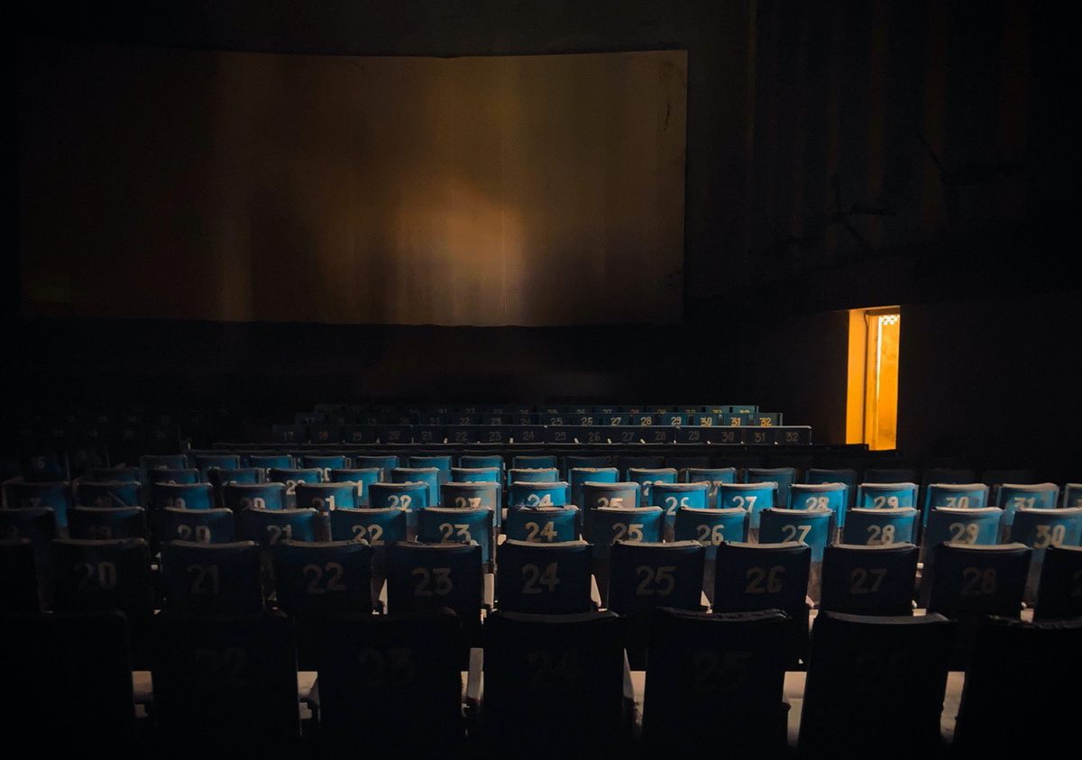 The screen and seats of Anurag Theatre in Meerut.