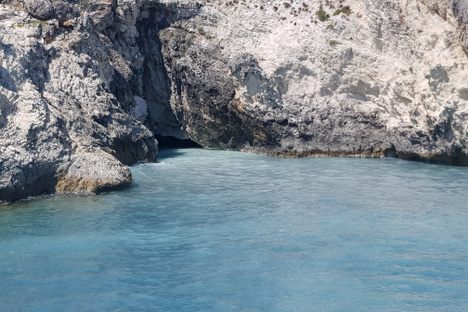 Sulphur rich water bubbling out of the sea cave.