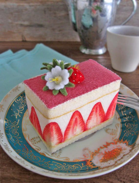 An elegant cake with printed strawberries.