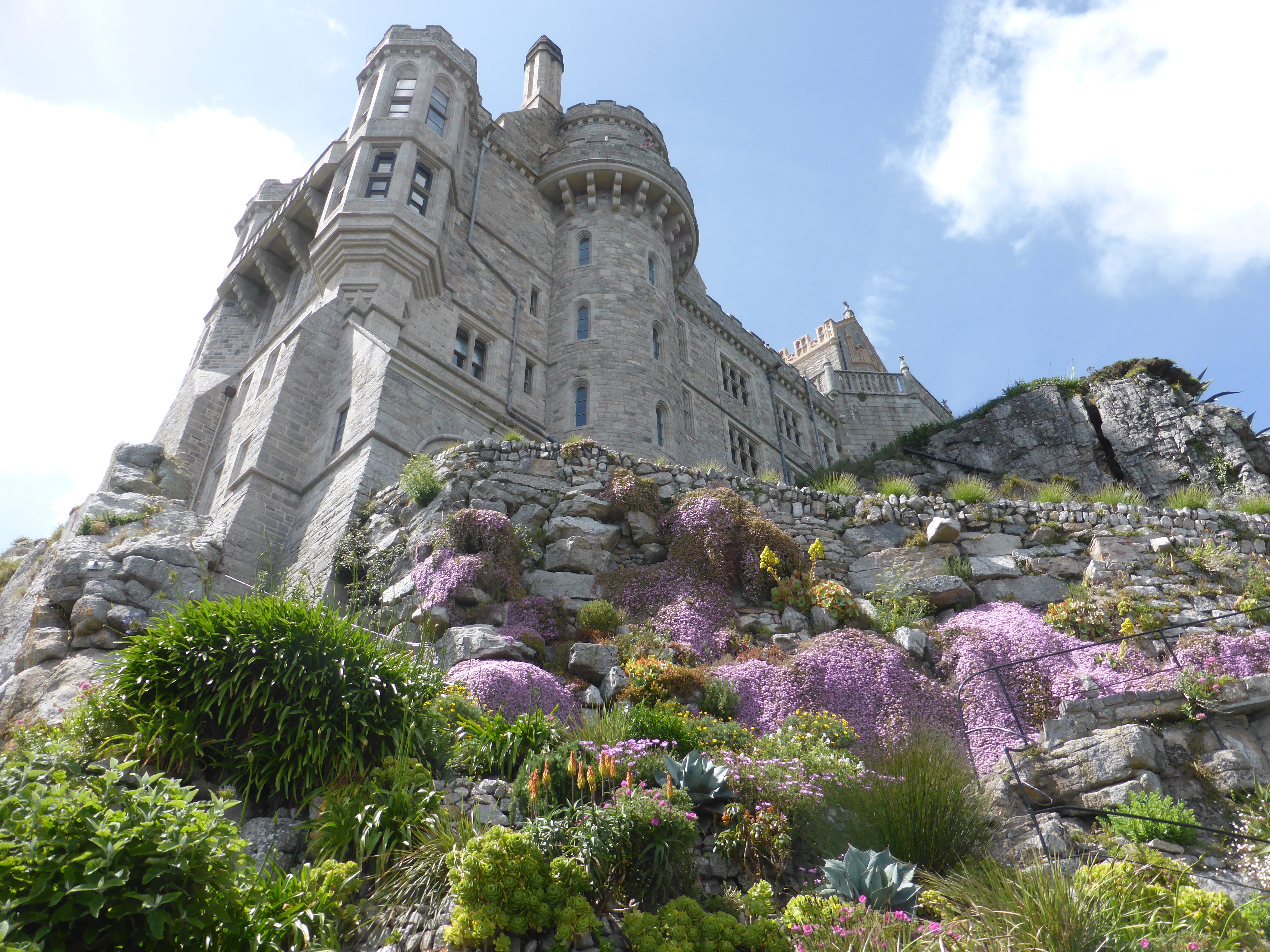 The castle on St. Michael's Mount towers over precarious gardens.