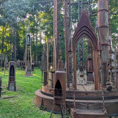 The <em>Superstructure</em> in the backyard resembles the entrance to a cathedral. 