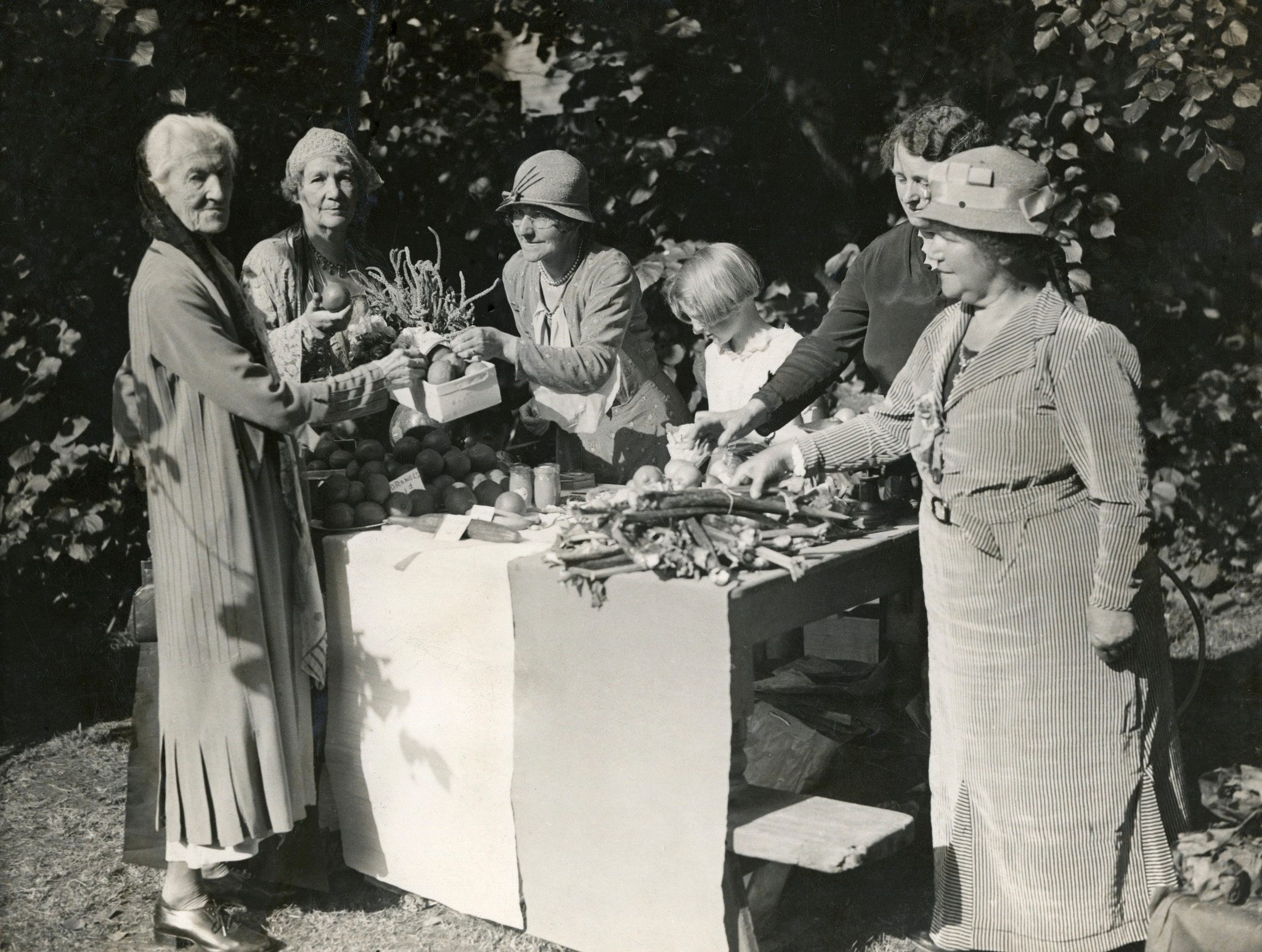 Suffragettes Charlotte Despard and Emmeline Pethick Lawrence buying vegetables.