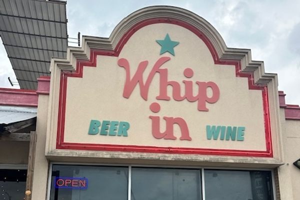 The exterior of Whip In.