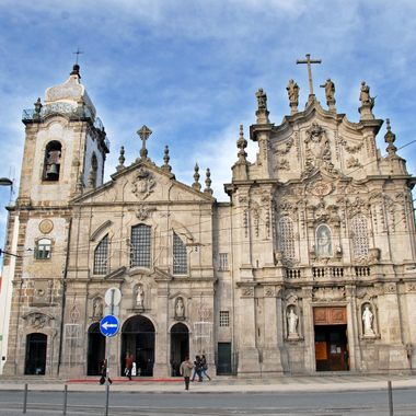 It's easy to miss the house wedged between these churches.