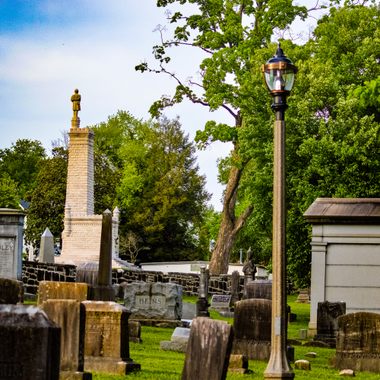 The Confederate soldier monument towers over an aging portion of Old Gray cemetery.