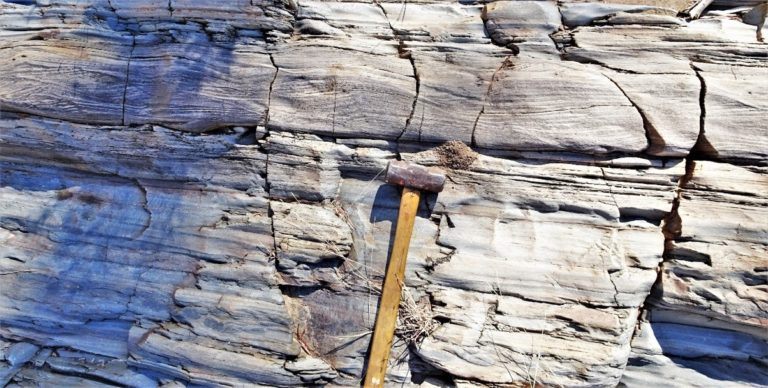 Sandstone sedimentary rocks in Georgetown, deposited off the coast of North America adjacent to present-day Canada.