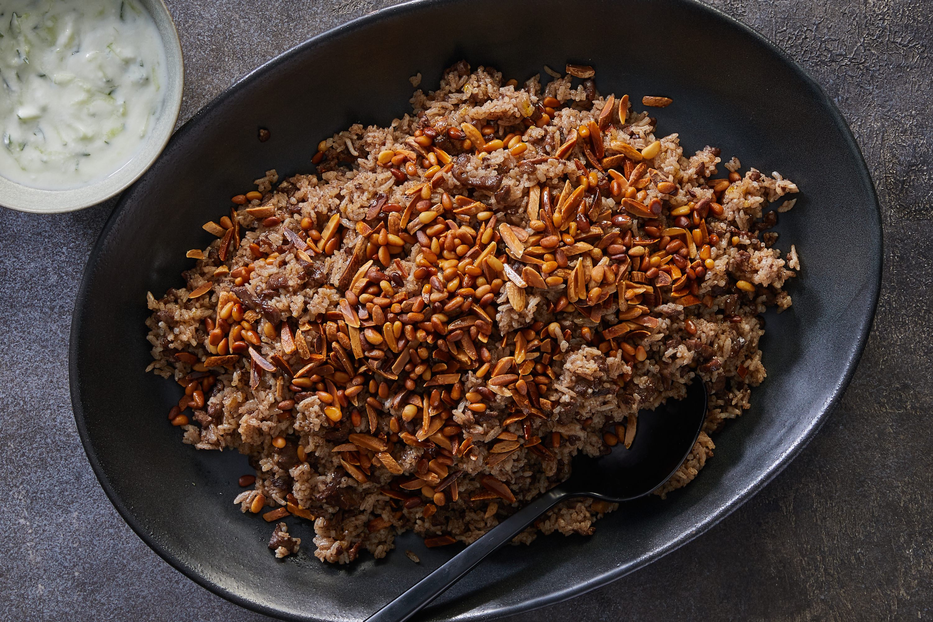 Hashweh, spiced rice and meat with yogurt.