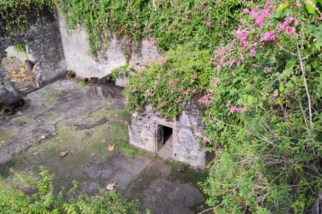 Prison cell viewed from the ruins of the theatre above.