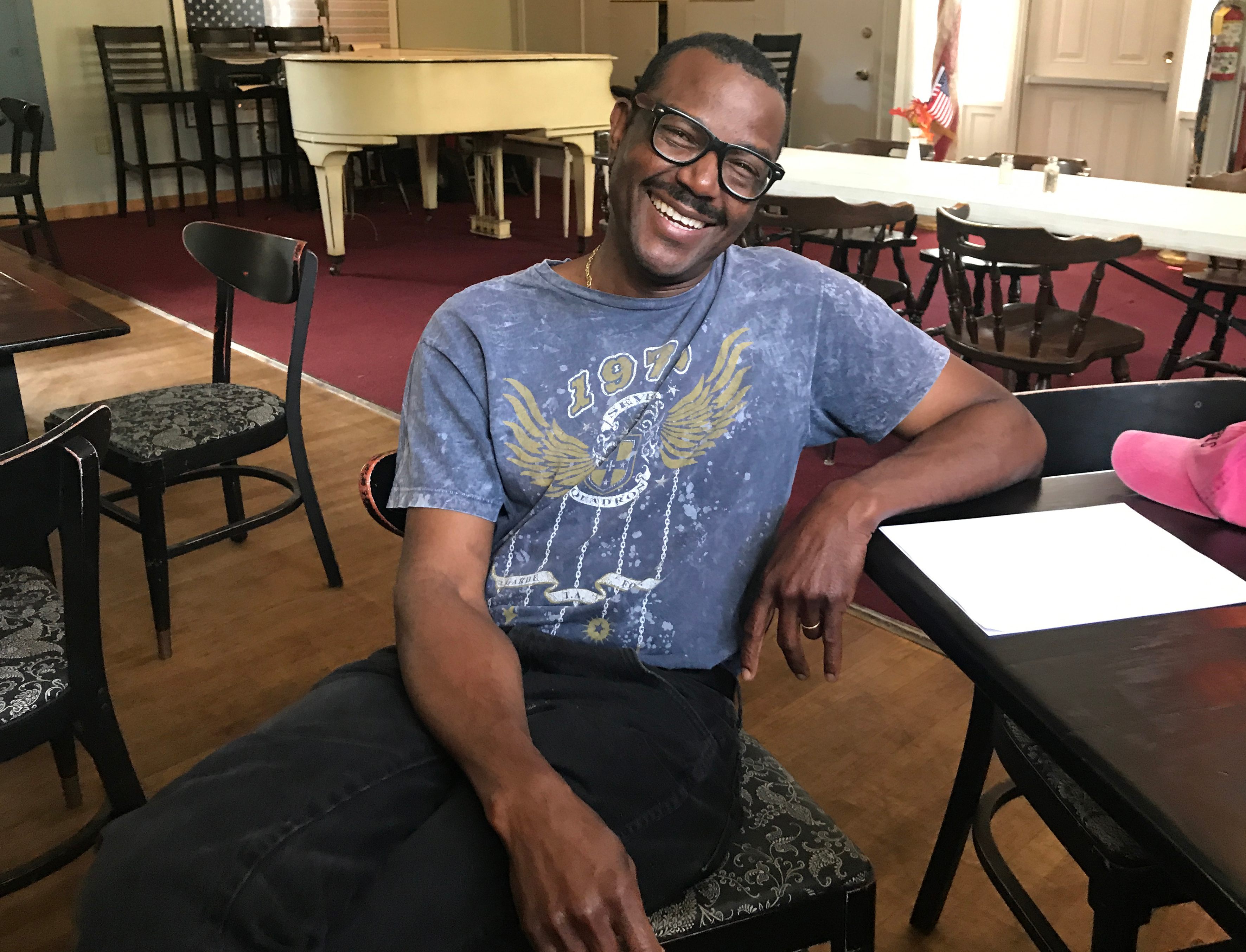 Chef and pastor Deon Thomas inside of his restaurant.