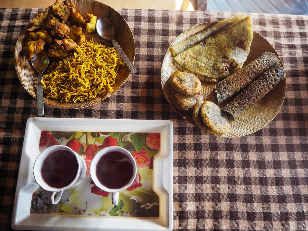 Tea and snacks made from tapioca flour at Hendri Momin’s cafe in Darechikgre.