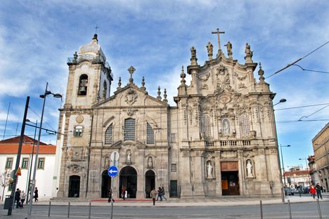 It's easy to miss the house wedged between these churches.