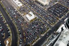 Parking lots eat U.S. cities.