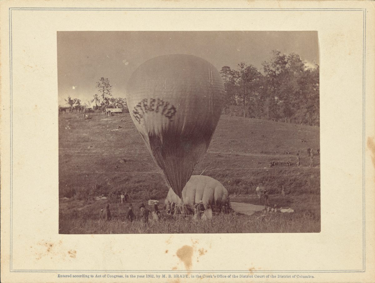 <em>Professor Lowe Inflating Balloon Intrepid</em>, Studio of Mathew B. Brady, 1862.
