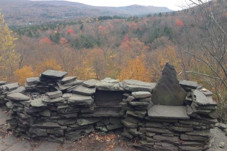Fire pit, small seat, valley view