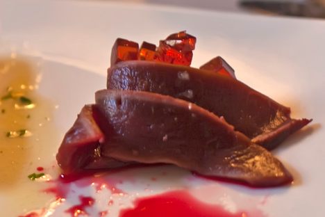 Slightly smoked reindeer heart with gelée made of rowan berry wine.