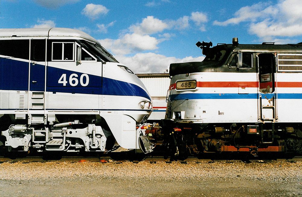 A newer model from 1998 meets an old diesel locomotive. 