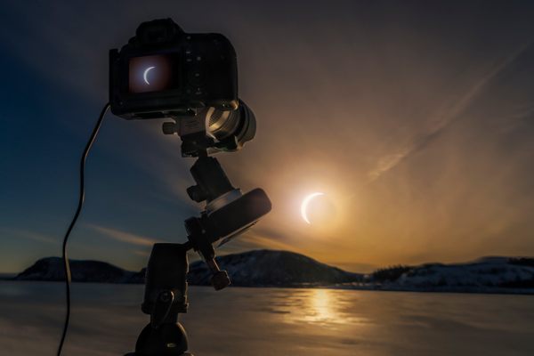 A solar eclipse underway in Iceland's Thingvellir National Park. The island nation will be in the path of totality again in 2026.