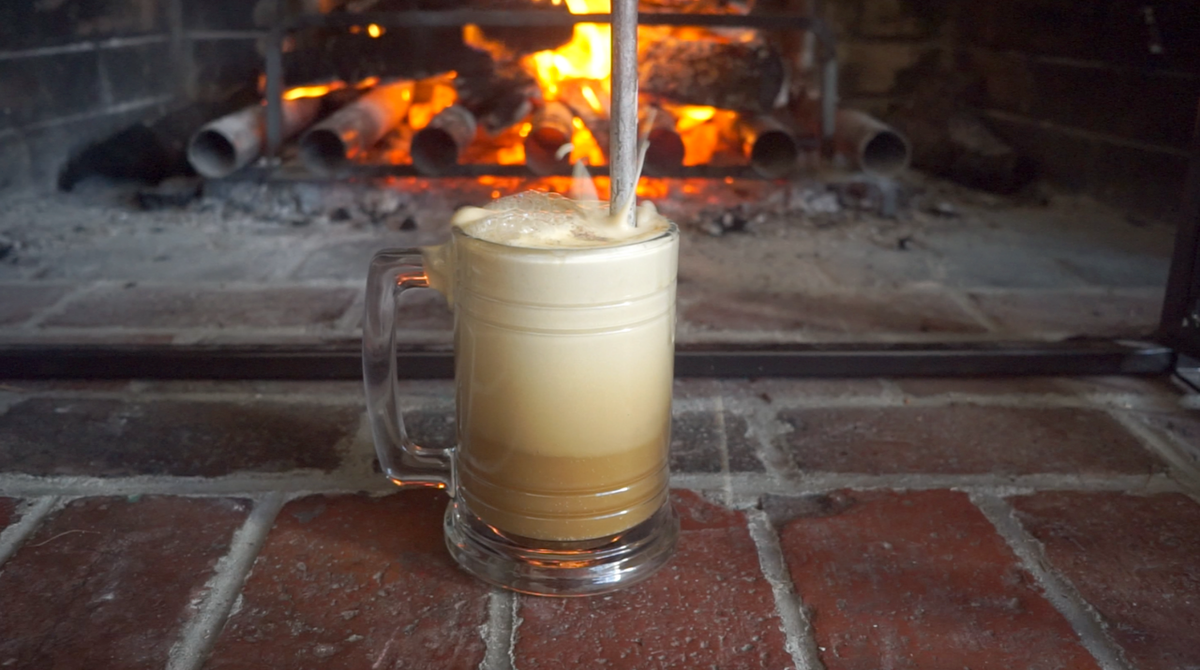 A recreation of a colonial hot ale "flip."