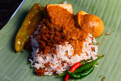 The name of this dish means "trader's rice" in Malay dialect.
