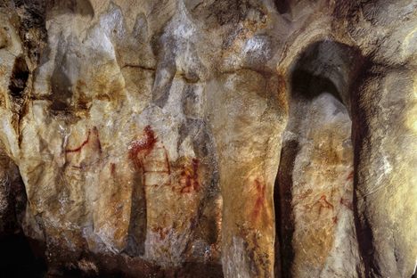 The ladder shape composed of red horizontal and vertical lines (center left) dates to older than 64,000 years and was made by Neanderthals.