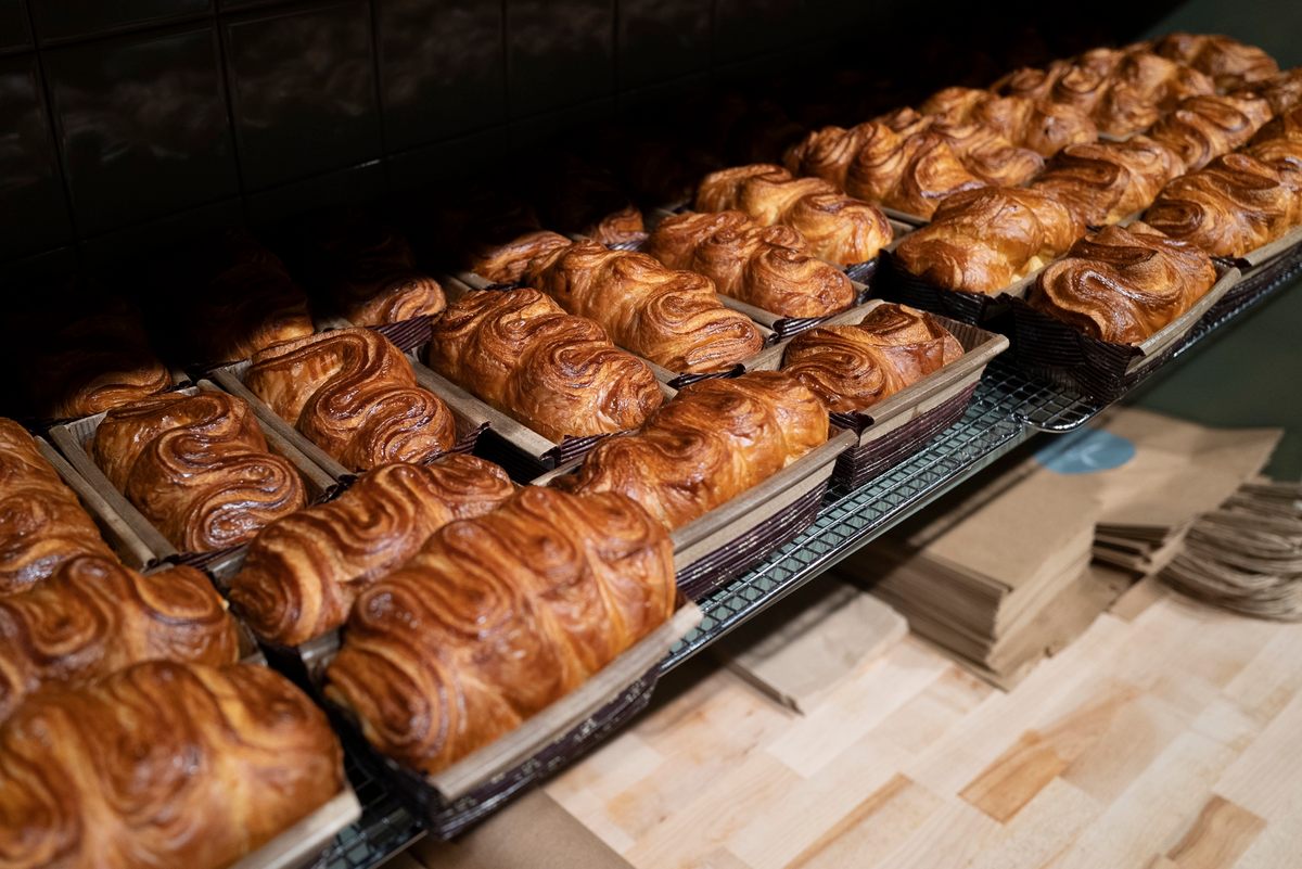 Dozens of laminated brioche loaves.