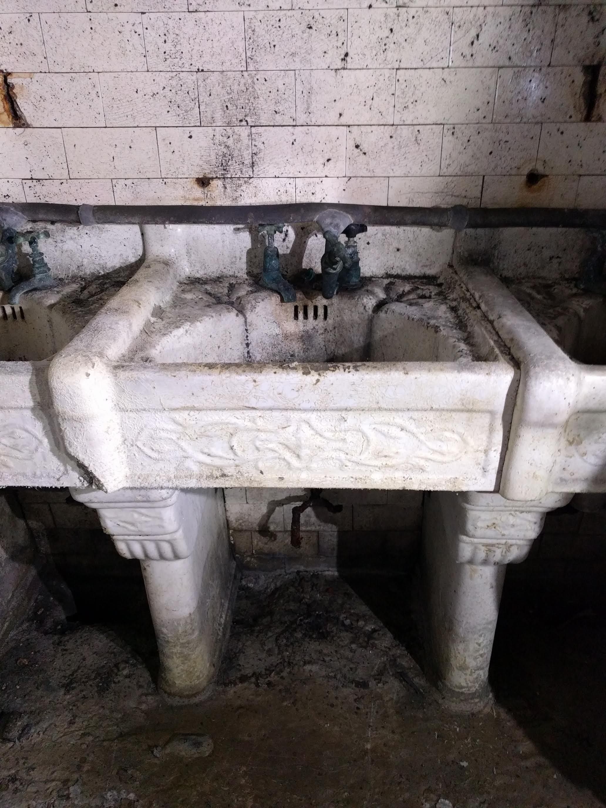 The design of the sinks is unusually ornate.