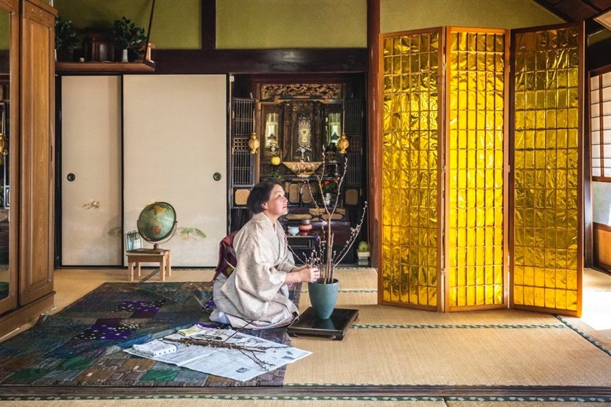 Akitoshi's wife, Akiko Fushiyama, in front of a shoji screen made out of Uplex—a material manufactured by UBE Industries, and used in satellites and spaceships to block galactic cosmic rays. 