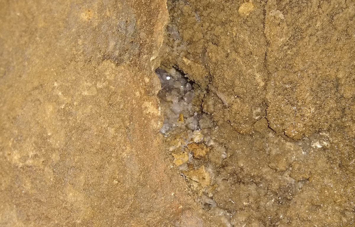 Crystals are found everywhere in the rock, but many, like these, probably aren't commercially viable.