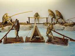 Taxidermied frogs spend a day on the lake at Froggyland
