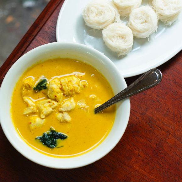 With fat chunks of crab meat swimming in a lush coconut milk curry, it's no wonder this dish is so popular.