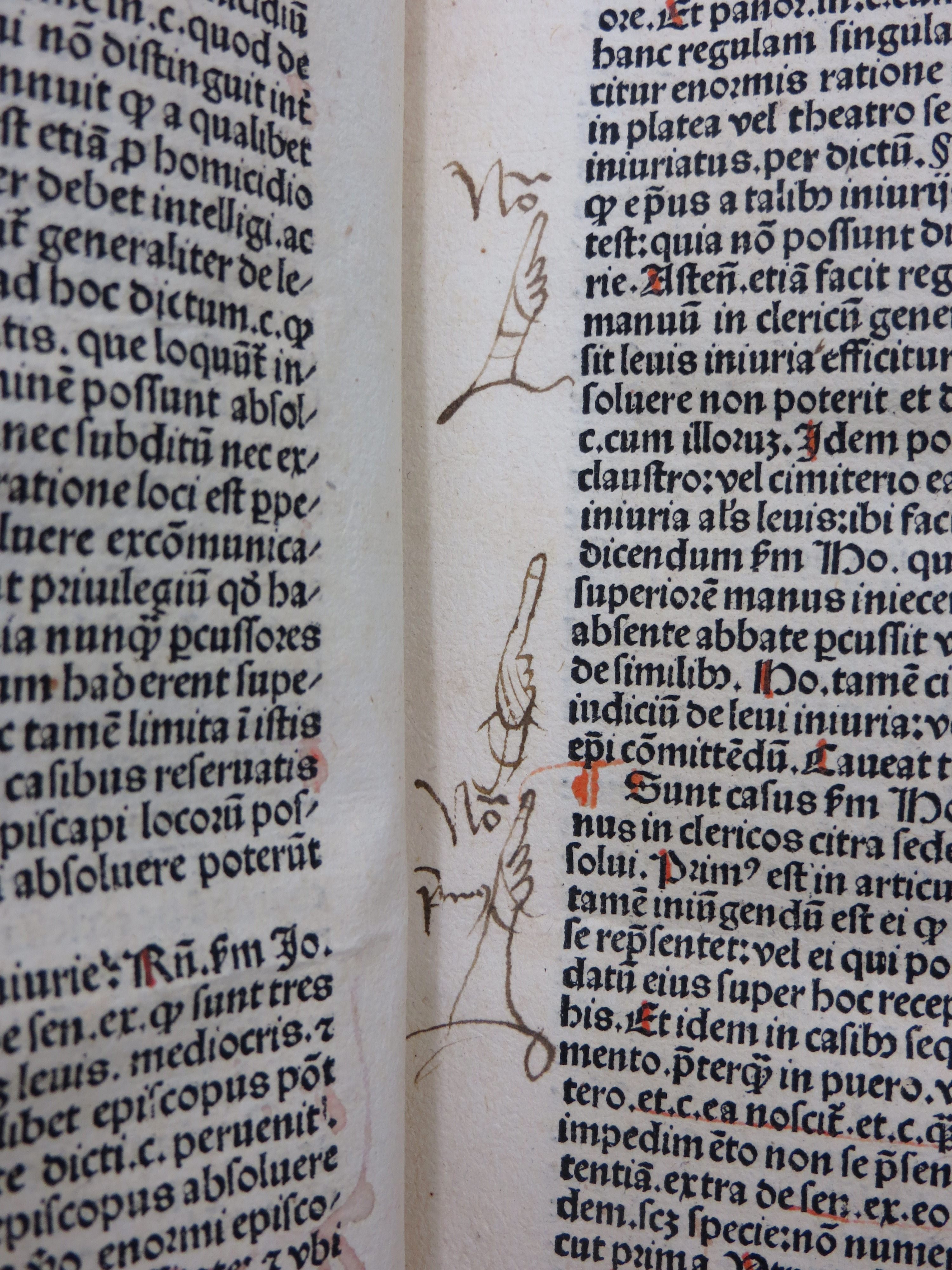 Multiple manicules. 