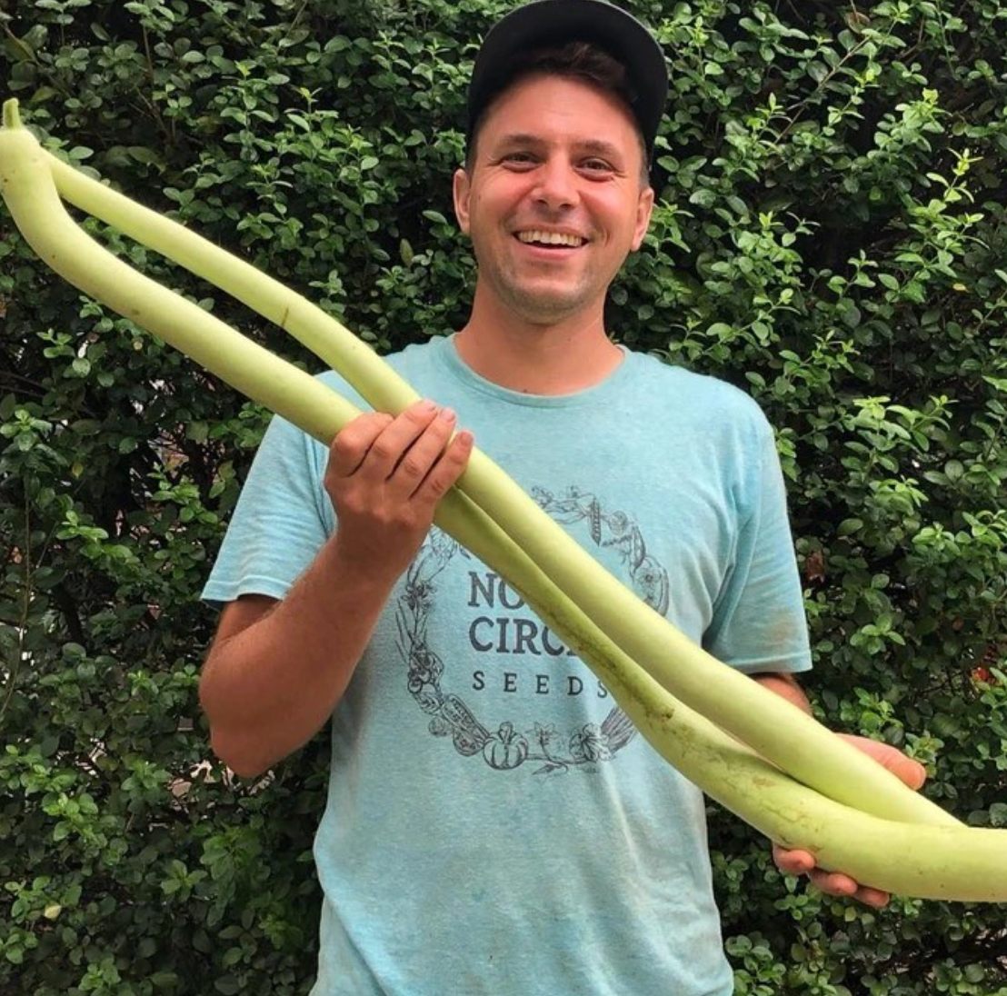 Owen Taylor holds a cucuzza, or "googootz."
