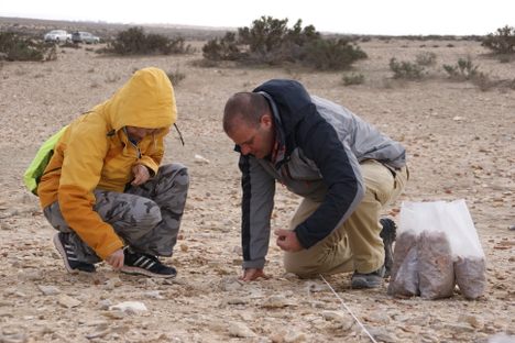  Guy Bar-Oz and his team survey the dump site.