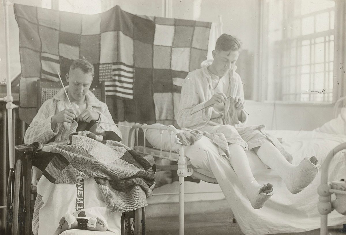 Wounded soldiers knit in a hospital, 1918.