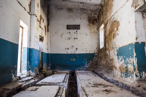 Inside a ruined factory.