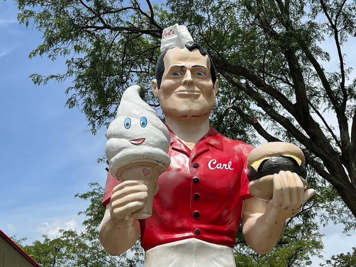 Muffler men come in many molds and hold various objects to promote different services.