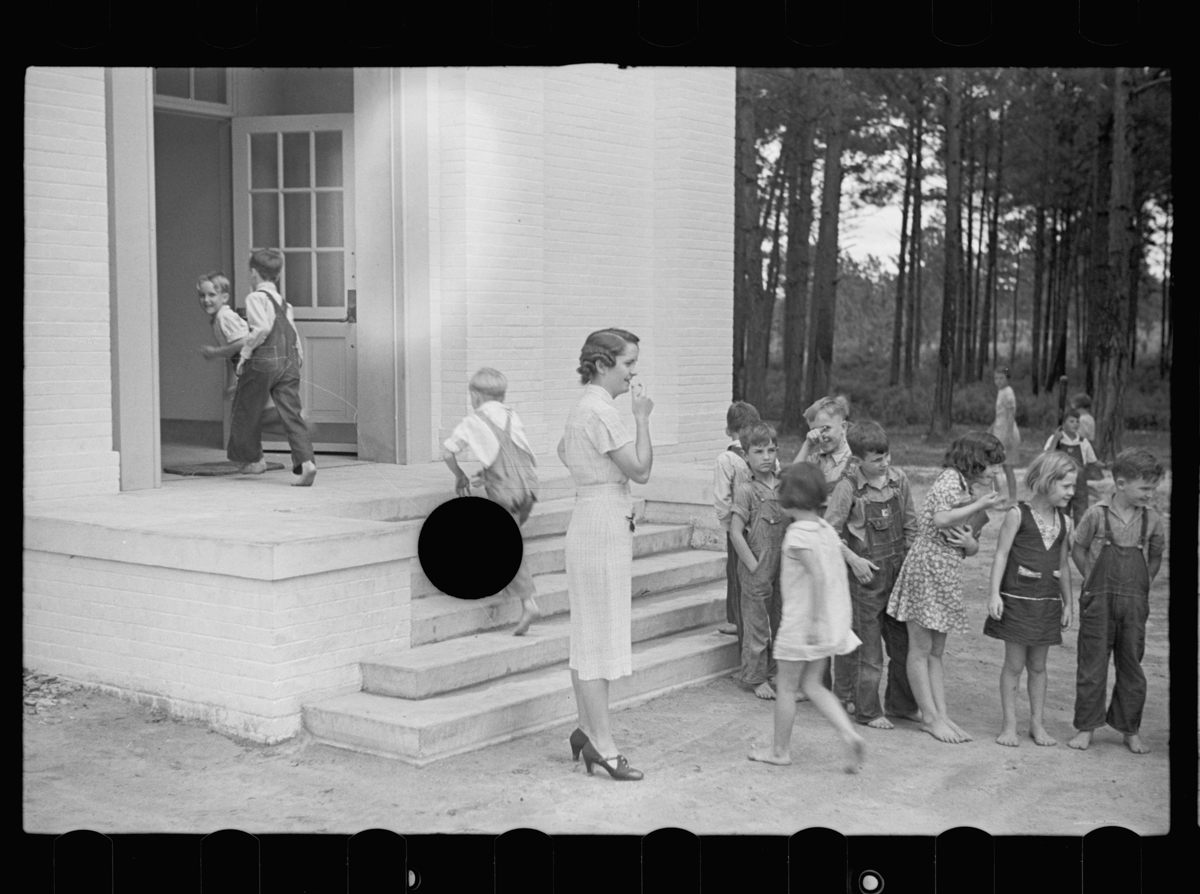 <em>Untitled photo, possibly related to: Schoolteacher and children, Irwinville School, Georgia.</em>