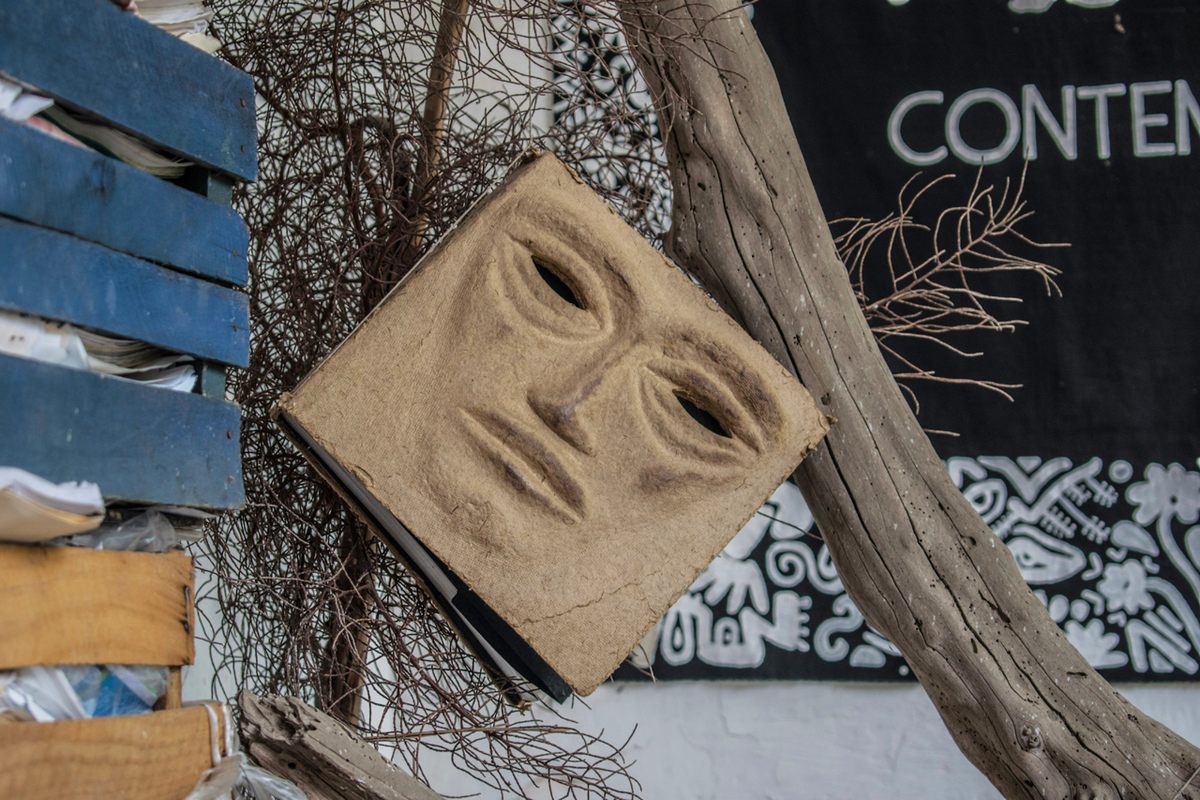 <em>Incantations: Songs, Spells, and Images by Mayan Women</em>—the first book in the Tzotzil Maya language published in 400 years—hangs from a leafless handmade tree in the workshop courtyard.