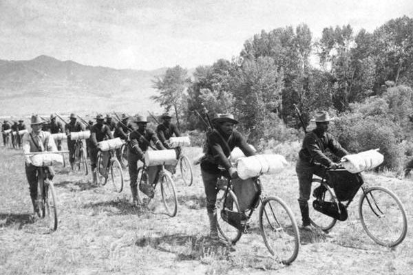 Lt. Moss rides alongside the men of the 25th.