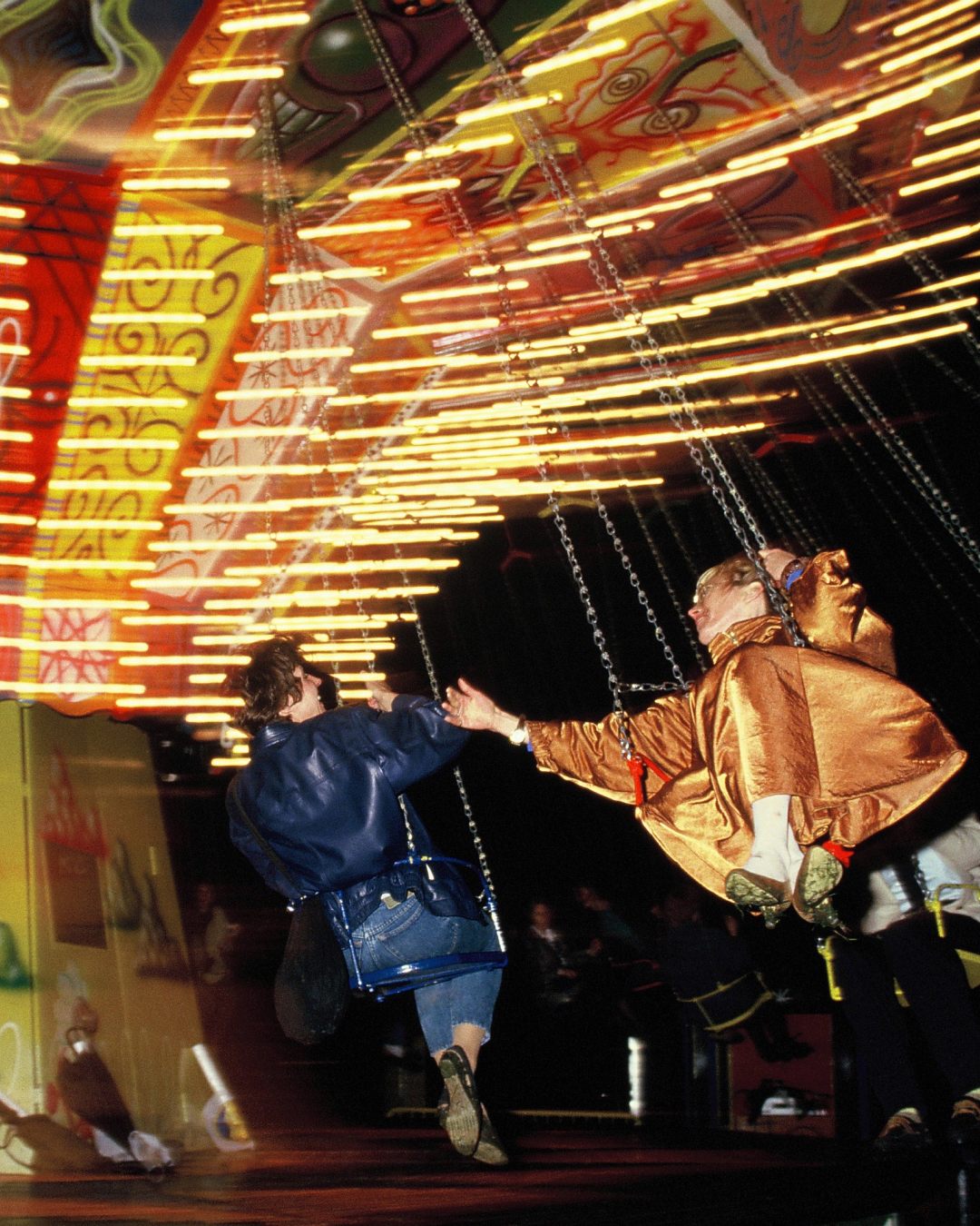 Born in Los Angeles, Kenny Scharf credited his self-described, colorful “pop surrealist” style to the fact that he had grown up near Disneyland while being fed a steady diet of sitcoms and cartoons. His swing ride for Luna Luna (shown here) exemplifies his whimsical style.