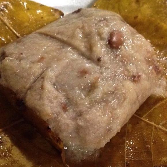 The dumpling gets boiled inside a hickory leaf. 
