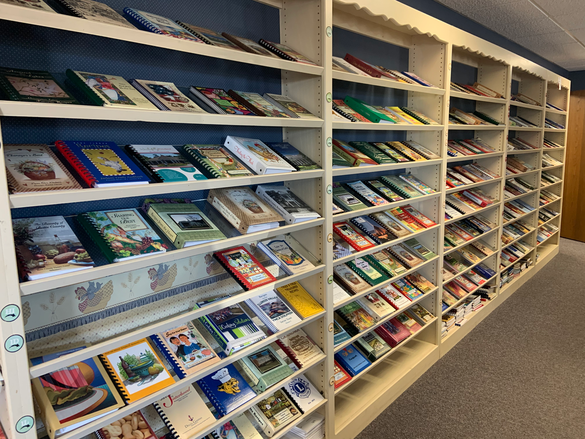 The wall of state cookbooks in the bookstore.