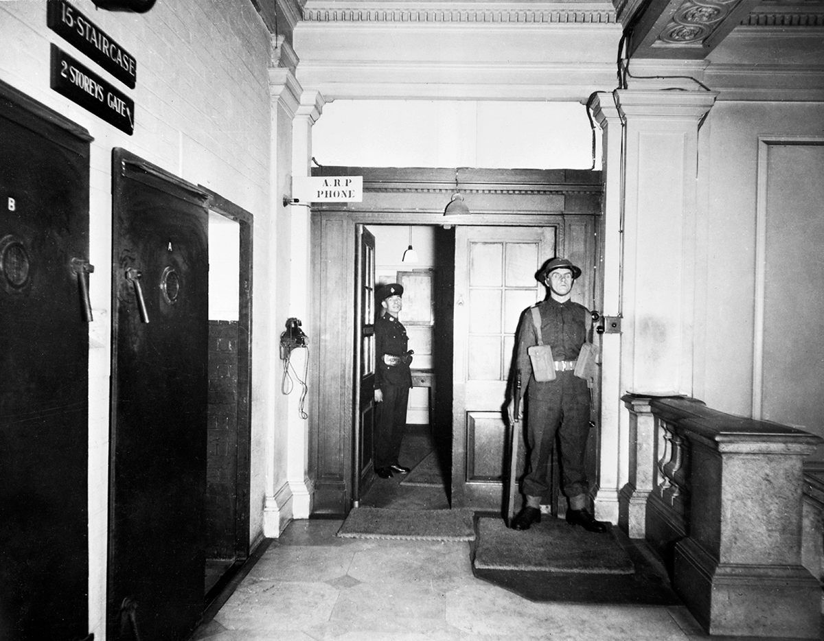 On the left is the internal door that led down into the War Rooms. The double doors at center led to the annex of 10 Downing Street, where Churchill and family lived from December 1940.