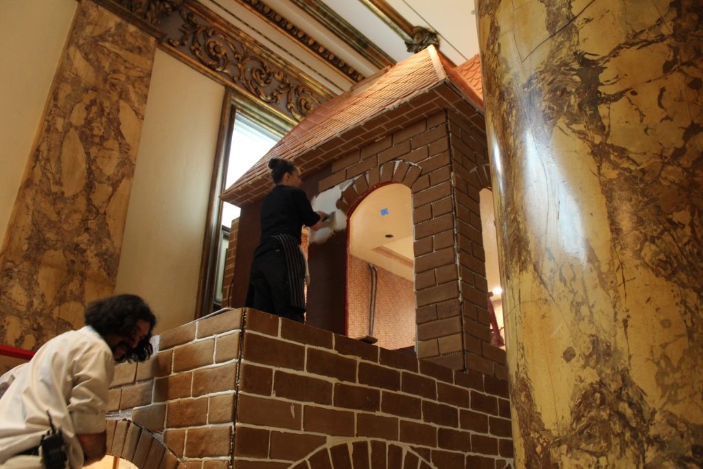 No mere gingerbread cottage, this house reaches the ceiling.