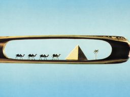 Ancient Egyptian scene inside of the head of a needle