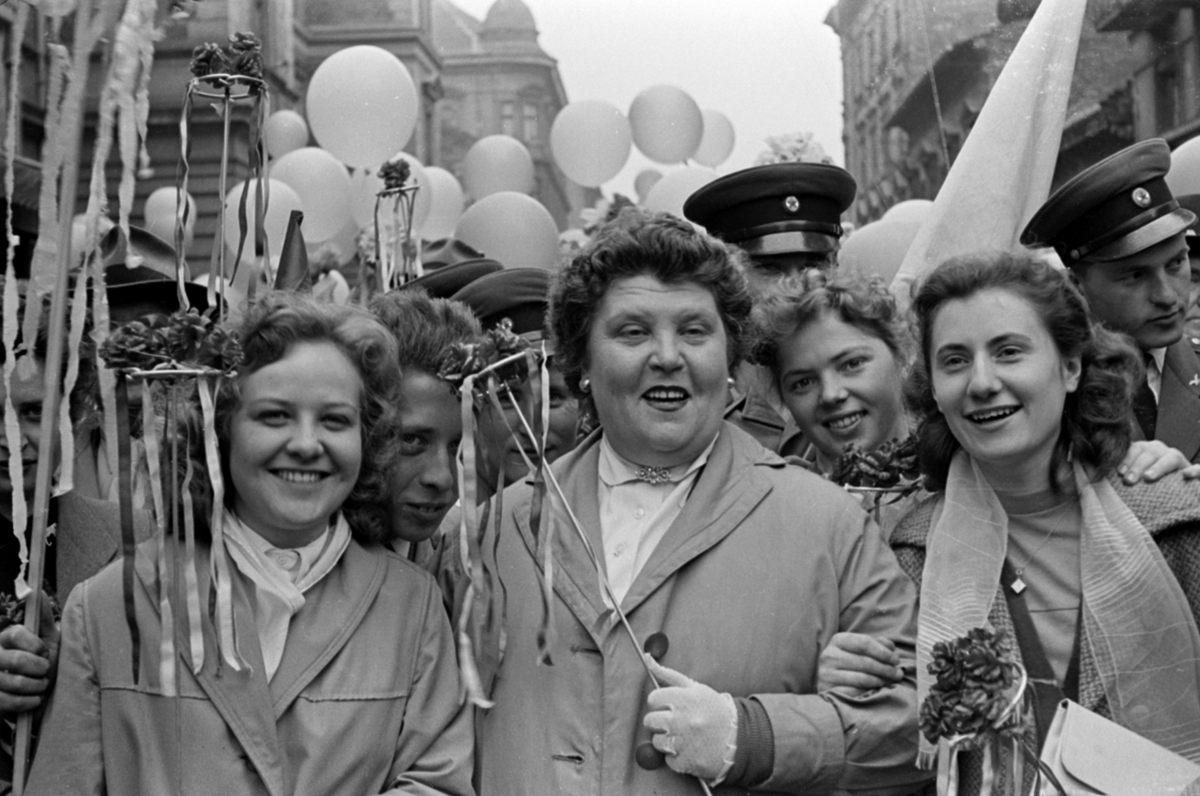 It's all smiles at a 1957 parade.