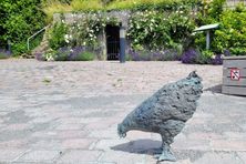 Bronze hen near the spring.